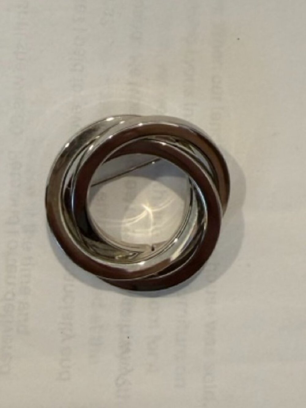 Vintage modernist intertwined triple circle brooch